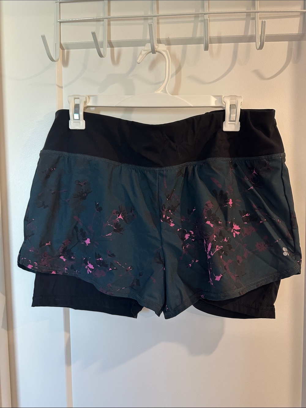 Sweaty Betty Black Overlay Shorts with Teal and Pink Accents